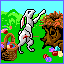A rabbit painting eggs, and putting them in a basket