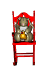 A bunny and a chick on a rocking chair