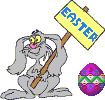 A rabbit holding a sign saying Easter, with a decorated egg